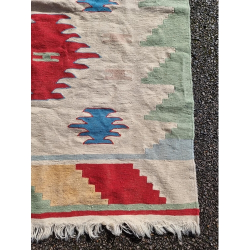 1143 - A Tribal flatweave rug, 177 x 115cm.