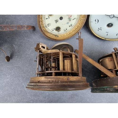 1781 - A mixed group of clocks and timepiece dials and movements, to include a Smiths car clock.... 