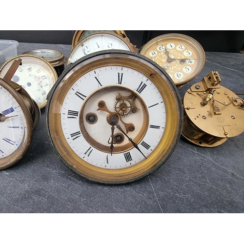 1781 - A mixed group of clocks and timepiece dials and movements, to include a Smiths car clock.... 