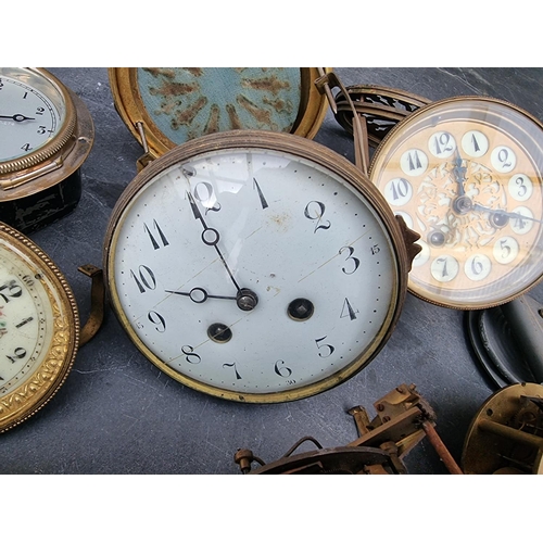 1781 - A mixed group of clocks and timepiece dials and movements, to include a Smiths car clock.... 