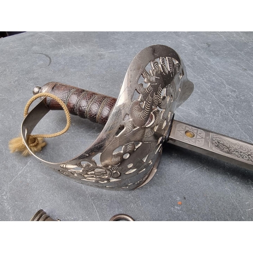 101 - An Edwardian 1897 pattern infantry officer's sword and steel scabbard, with 82cm etched blade.... 