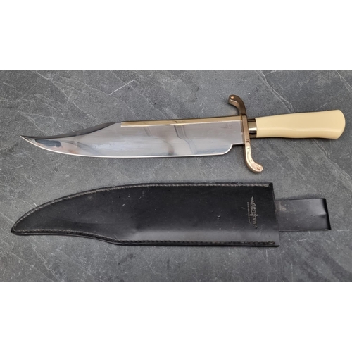 114 - A Hibben GH517 Bowie knife and sheath, having 35cm blade.