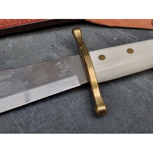 116 - A Case XX USA Bowie knife and sheath, having 24cm blade.