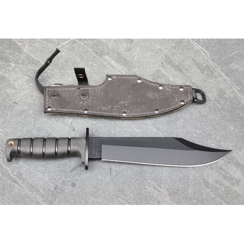 118 - An Ontario 'Spec-Plus Raider SP10' Bowie knife and sheath, having 24cm blade.