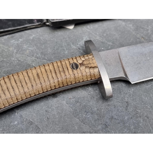 119 - A Boker 'Arbolito N695' knife and sheath, having 23.5cm blade.