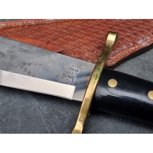 124 - A Case XX USA Bowie knife and sheath, having 24cm blade.