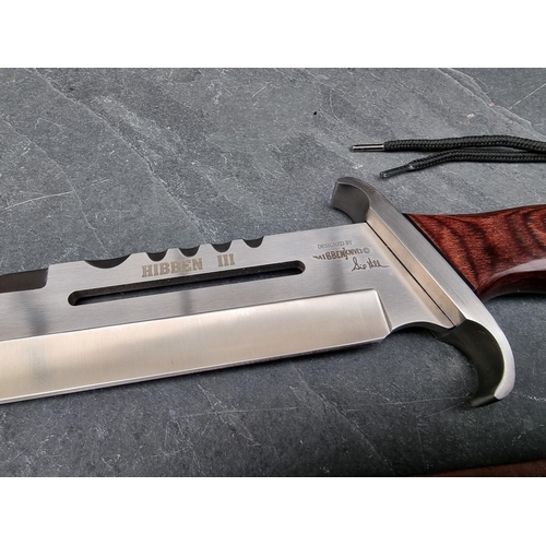 127 - A Hibben 'Mark 3' Bowie knife and sheath, having 27.5cm blade.