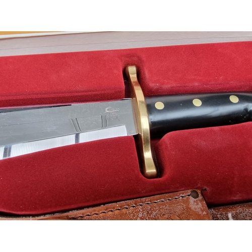 130 - A Case XX presentation 'CA286' Bowie knife and sheath, having 24cm blade, boxed.