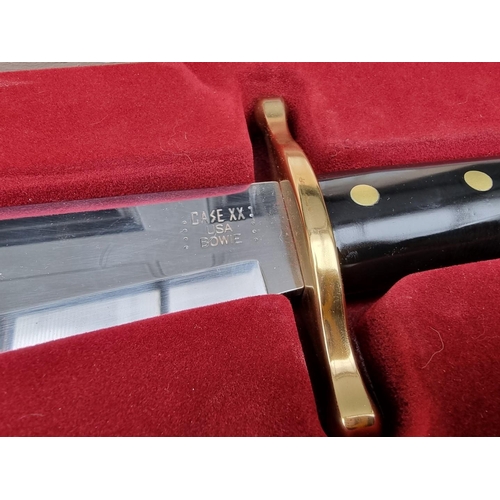 131 - A Case XX presentation 'CA311' Bowie knife and sheath, having 24cm blade, boxed.