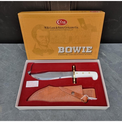 132 - A Case XX presentation 'CA2000' Bowie knife and sheath, having 24cm blade, boxed.