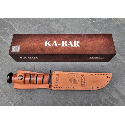 137 - A Ka-Bar '1217' USMC knife and sheath, having 18cm blade, boxed.