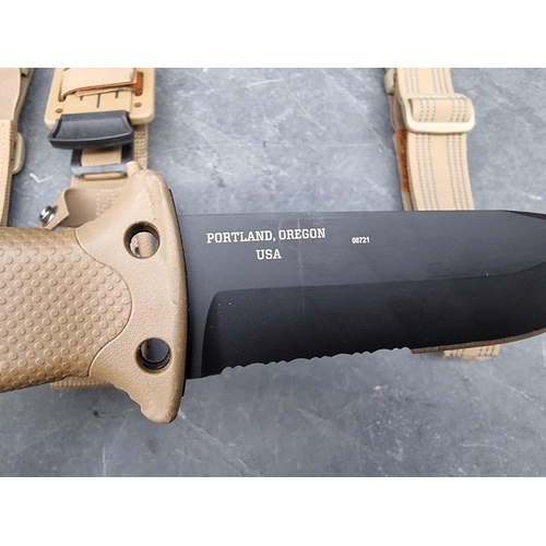 143 - A Gerber 'LMF Mk2 Infantry Coyote Brown' knife and sheath, having 12.5cm blade, boxed.... 