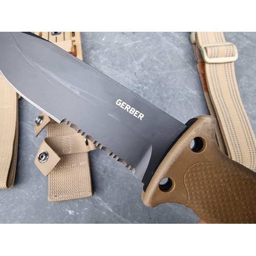 143 - A Gerber 'LMF Mk2 Infantry Coyote Brown' knife and sheath, having 12.5cm blade, boxed.... 