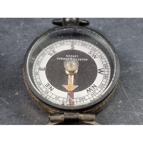 163 - A WWI compass, by Negretti & Zambra, 54mm diameter, in leather case.