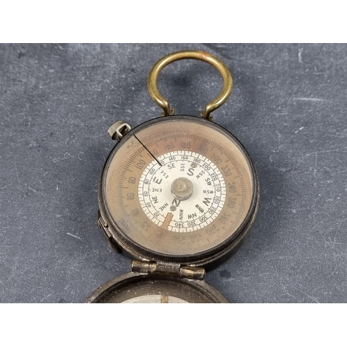 175 - A WWI British officer's military compass, by S Mordan & Co, dated 1918 with broad arrow mark and... 