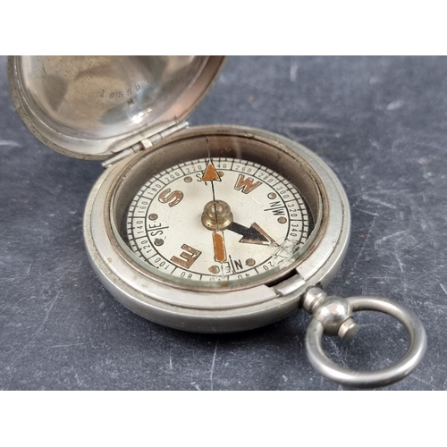 178 - A WWI British military Mk.VI nickel plated pocket compass, by Clement Clarke Ltd, London, dated 1918... 