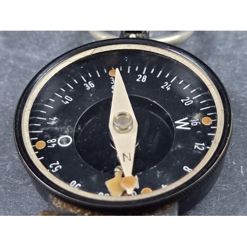 187 - A WWII German Wehrmacht marching compass, by Busch, Serial No.78645, 54mm.