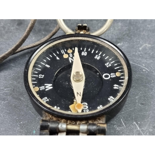 188 - A WWII German Wehrmacht marching compass, by Busch, Serial No.71090, 54mm.