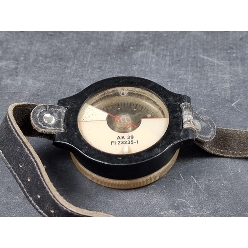 190 - A WWII German Luftwaffe AK 39 wrist compass, No.F1 23235-1, with leather strap, 62mm.... 