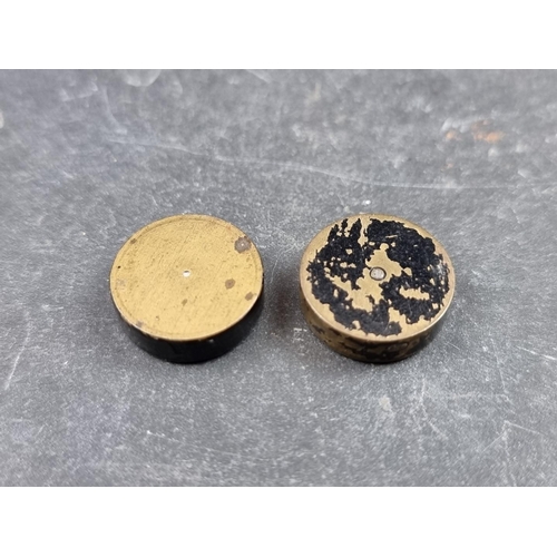 192 - Two incomplete WWII British 'Escape and Evasion' compasses, comprising a 'pill box' and a tunic butt... 