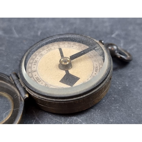 194 - A WWI marching compass 'The Groper', by Lawrence & Mayo, 54mm.