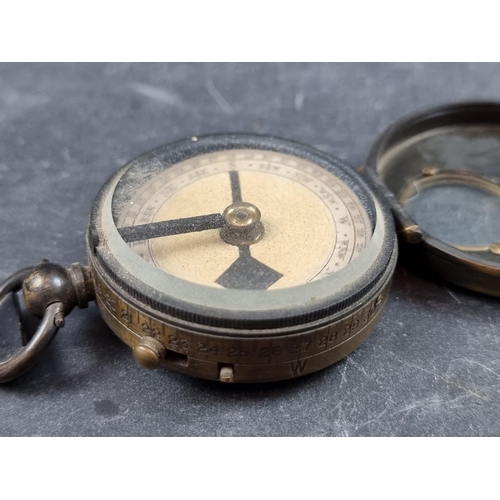 194 - A WWI marching compass 'The Groper', by Lawrence & Mayo, 54mm.