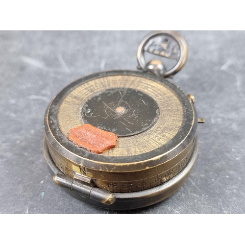 194 - A WWI marching compass 'The Groper', by Lawrence & Mayo, 54mm.