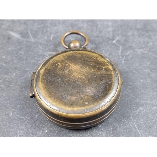 198 - A cased early 20th century brass hunter compass, 62mm.