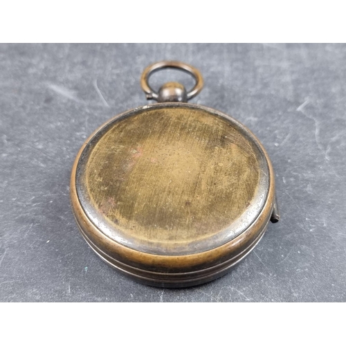 198 - A cased early 20th century brass hunter compass, 62mm.