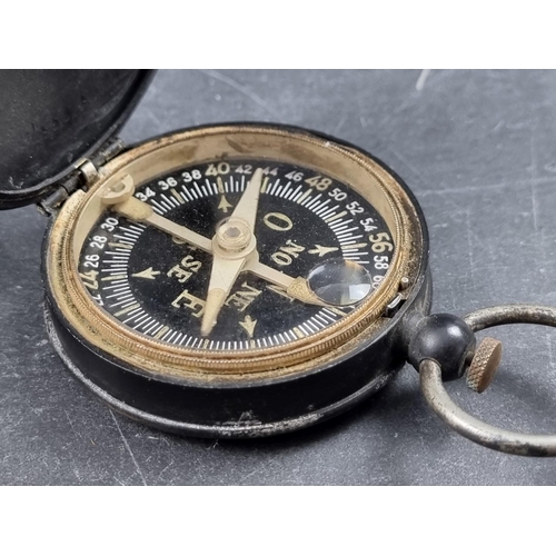 202 - A circa 1930s Continental hunter compass, 62mm, in leather case.