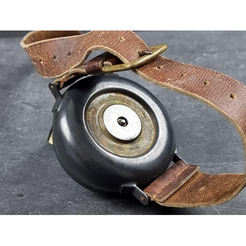 204 - A circa 1940s aeronautical wrist compass, by Dent & Co & Johnson, Linwood, with leather stra... 