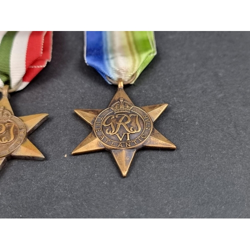 212 - Medals: a WWII group of six, to include: Atlantic Star; Italy Star and Defence Medal.... 