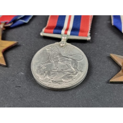 212 - Medals: a WWII group of six, to include: Atlantic Star; Italy Star and Defence Medal.... 