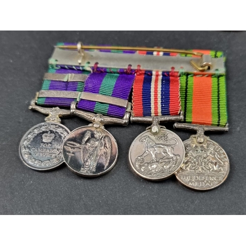 213 - Medals: a group of four, to 54552 Flight Lieutenant F T Dent, R.A.F, comprising: WWII War and Defenc... 