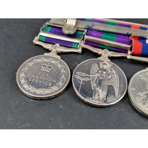 213 - Medals: a group of four, to 54552 Flight Lieutenant F T Dent, R.A.F, comprising: WWII War and Defenc... 