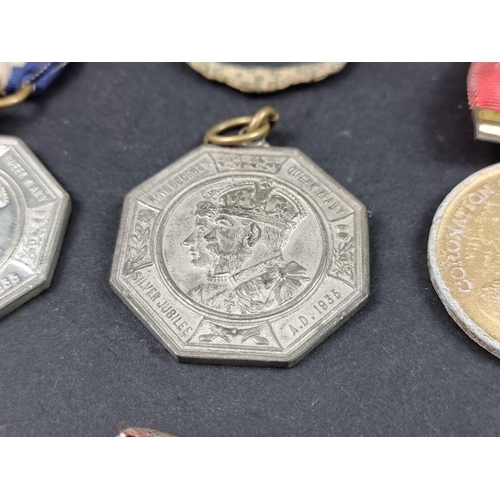 217 - Three Royal Commemorative medals, George V and Edward VII; together with a 17th century alloy shoe b... 