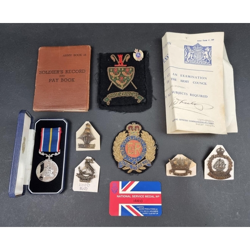 222 - Medals: a National Service Medal, Pay Book and Identity Card, to 22981519 A J Evans R.A; together wi... 