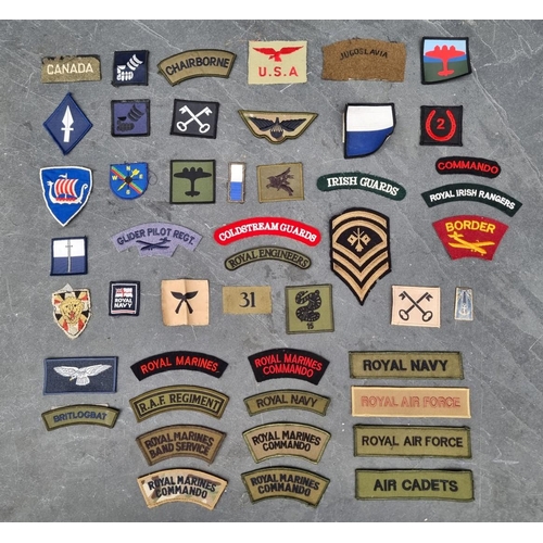 249 - WITHDRAWN FROM SALE A quantity military cloth badges.