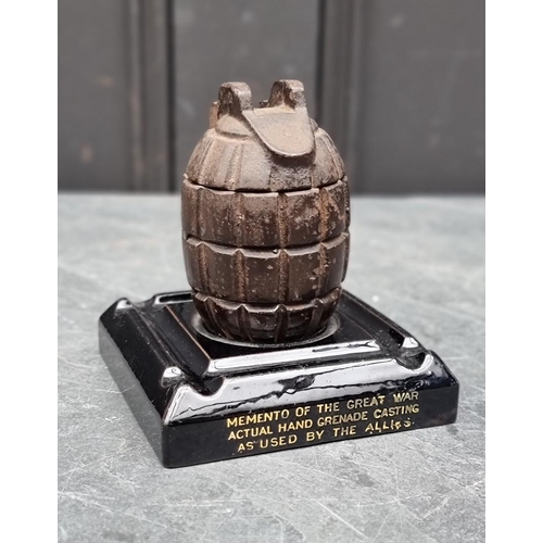 258 - A WWI novelty grenade inkwell, the pottery base inscribed 'Memento Of The Great War - Actual Hand Gr... 