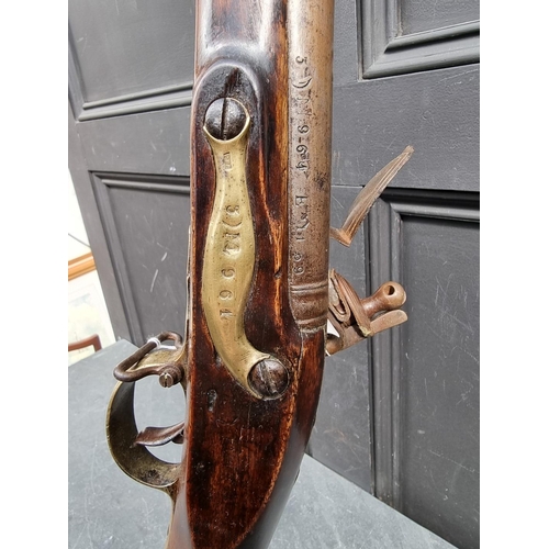 26 - A 'Brown Bess' musket, with 38in barrel, tower marked lock and bayonet, barrel and lock both numbere... 