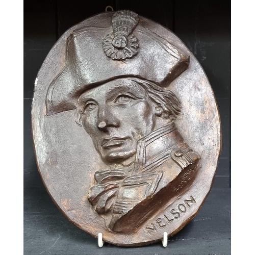 262 - A painted plaster oval plaque of Admiral Lord Nelson, 26cm high