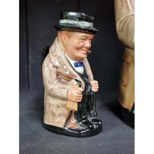 264 - Three Royal Doulton Sir Winston Churchill character jugs, largest 22cm high.