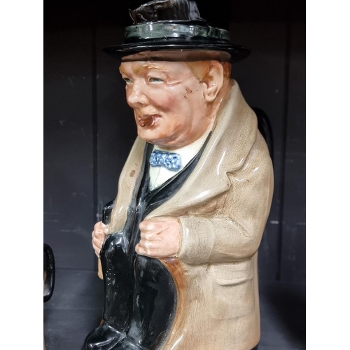 264 - Three Royal Doulton Sir Winston Churchill character jugs, largest 22cm high.