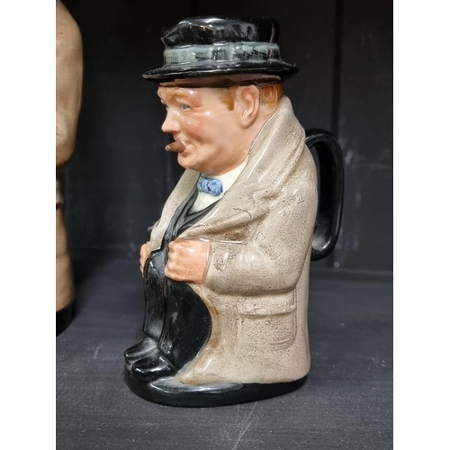 264 - Three Royal Doulton Sir Winston Churchill character jugs, largest 22cm high.