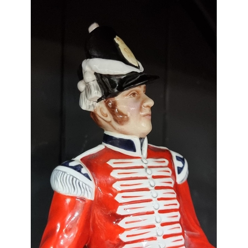 265 - A Michael Sutty porcelain military figure of 'Grenadier', printed factory marks and 'No.41' to base,... 