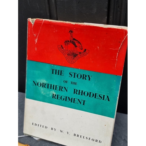 270 - The Northern Rhodesia Regiment: comprising a rare military officer's bamboo swagger stick, 70cm; a s... 