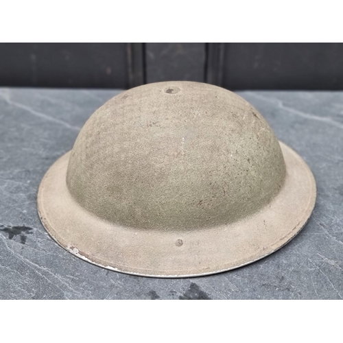 287 - A British military Brodie pattern steel, helmet with R.A.S.C insignia.