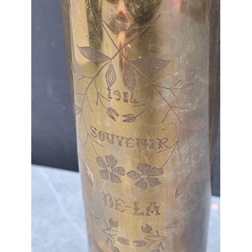 295 - A WWI French trench art 75mm shell case, inscribed '1914 A Souvenir De-La Guerre', 35cm high.... 