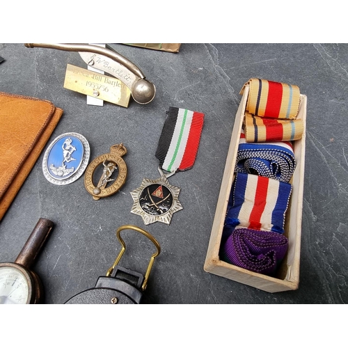 306 - WITHDRAWN FROM SALE A quantity of British military buttons; together with medal ribbon and empty bul... 