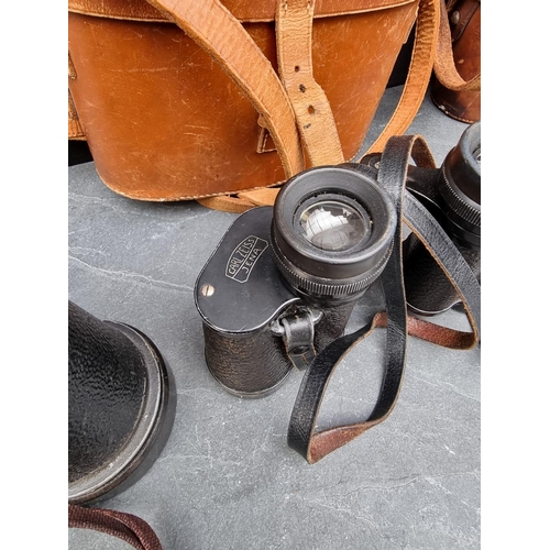 307 - Four various binoculars, to include: a pair of Barr & Stroud CF41 7x; and a pair of Carl Zeiss D... 